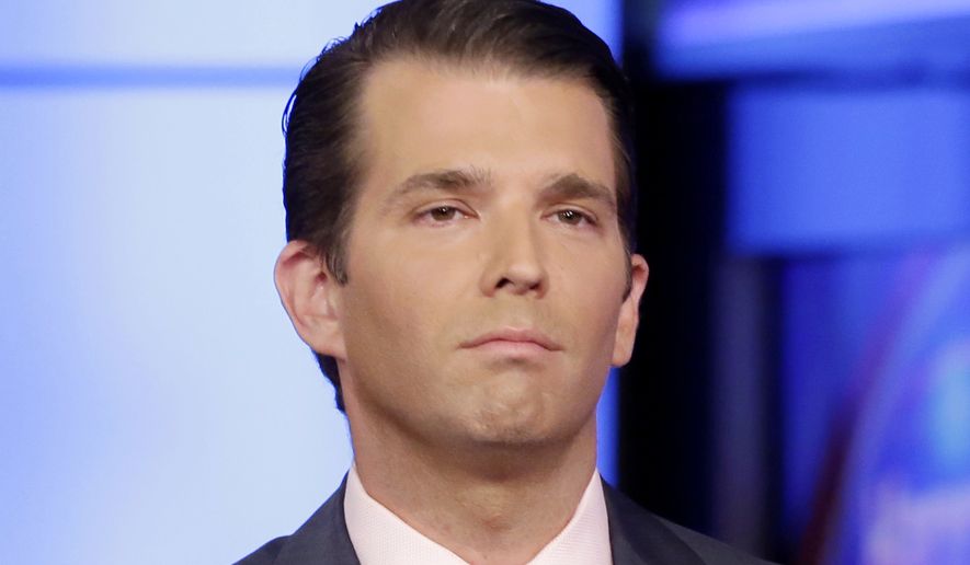 In this July 11, 2017, file photo, Donald Trump Jr. is interviewed by host Sean Hannity on his Fox News Channel television program, in New York. (AP Photo/Richard Drew) ** FILE **