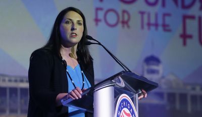 Michigan Republican Party Chairman Ronna Romney McDaniel addresses attendees during the 2016 Mackinac Republican Leadership Conference, Friday, Sept. 18, 2015, in Mackinac Island, Mich. (AP Photo/Carlos Osorio)
