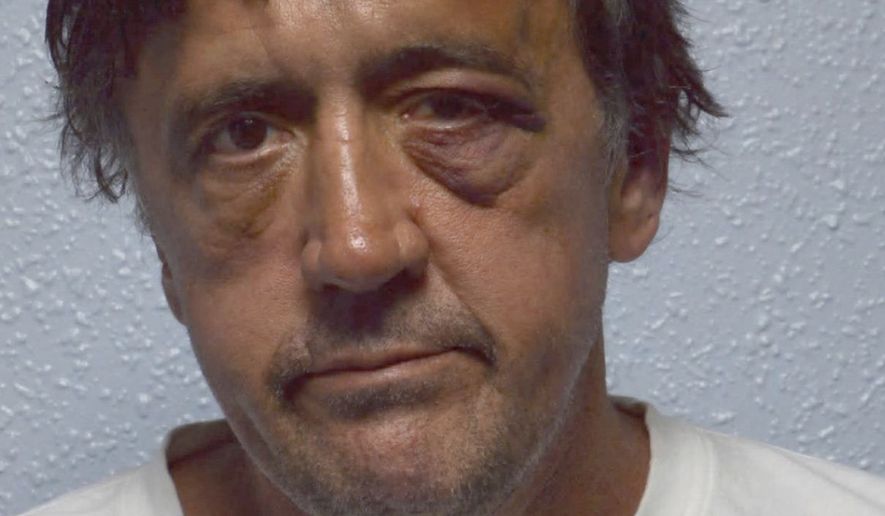 In this undated image provided by London's Metropolitan Police, showing Darren Osborne, 48, following his arrest after a vehicle struck pedestrians near a mosque in north London. A Crown Court on Thursday. Feb. 1, 2018, found Darren Osborne guilty of murder and attempted murder in the June 2017 attack in the city's Finsbury Park neighborhood. (Metropolitan Police via AP)
