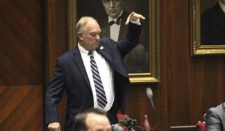 Arizona Republican state Rep. Don Shooter drops his mic after voting no on a resolution expelling him from the Arizona House for a pattern of sexual harassment in Phoenix, Ariz., Thursday, Feb. 1, 2018. Shooter&#x27;s removal from office would be the first known vote kicking out a state lawmaker since revelations against filmmaker Harvey Weinstein spurred a national conversation on workplace harassment. (AP Photo/Bob Christie)