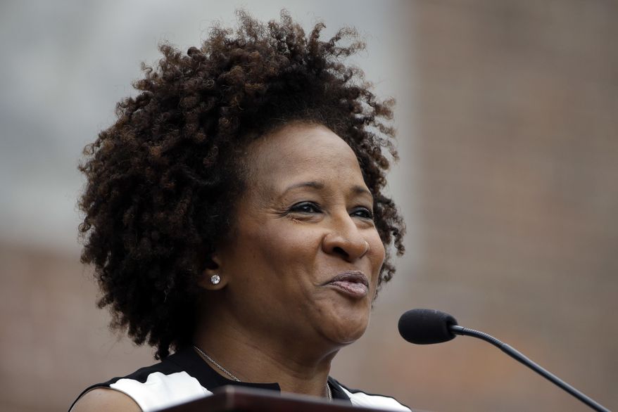 FILE - In this July 4, 2015 file photo, Wanda Sykes speaks during the National LGBT 50th Anniversary Ceremony in front of Independence Hall in Philadelphia. Sykes, Gabourey Sidibe and Danny Glover will be among the readers for an audio edition of speeches and essays by the Rev. Martin Luther King Jr. “The Radical King” is a collection of 23 works by King that go beyond civil rights and emphasize his belief in the redistribution of wealth. The audio and print editions are scheduled for April 3, 2018, the eve of the 50th anniversary of King’s assassination. (AP Photo/Matt Rourke, File)