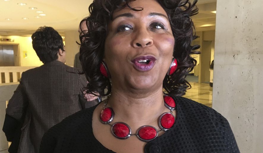 Sherry Johnson, who was forced to marry her rapist when she was 11, talks with reporters after the Florida Senate passed a bill she inspired that would ban child marriage. The bill passed unanimously Jan. 31, 2018, in Tallahassee, Florida. (AP Photo/Brendan Farrington)
