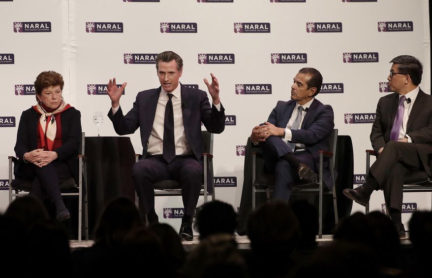 FILE - In this Jan. 30, 2018 file photo, Democratic Candidates for California Governor Delaine Eastin, from left, Gavin Newsom, Antonio Villaraigosa and John Chiang speak at a NARAL Pro-Choice California event in San Francisco. Lt. Gov. Gavin Newsom has far outraised his rivals in the race for California governor ahead of the June 5 primary. Campaign finance reports filed show Newsom had nearly $17 million in the bank at the end of last year, more than all his rivals from both parties combined. Former Los Angeles Mayor Antonio Villaraigosa and State Treasurer John Chiang both had just under $6 million socked away. Former state schools chief Delaine Eastin had just $184,000. (AP Photo/Jeff Chiu, File)