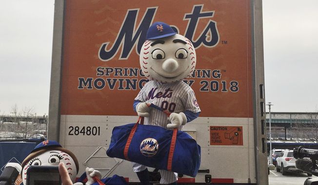 New York Mets mascot Mr. Met poses on the loading ramp of the team’s equipment truck at Citi Field, Thursday, Feb. 1, 2018, in New York, as the truck was packed to leave for spring training. (AP Photo/Ron Blum)