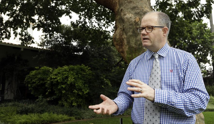 Grant Miller, a senior officer in Britain's Border Force, reacts during an interview with Associated Press in Johannesburg, South Africa, Thursday, Feb. 1, 2018. In South Africa for a British-hosted workshop on trafficking flora and fauna, Miller said that Britons made it clear in a recent consultation by the government that "a domestic ivory market in the United Kingdom is no longer socially acceptable." (AP Photo/Themba Hadebe)