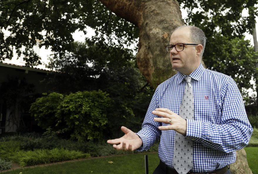 Grant Miller, a senior officer in Britain's Border Force, reacts during an interview with Associated Press in Johannesburg, South Africa, Thursday, Feb. 1, 2018. In South Africa for a British-hosted workshop on trafficking flora and fauna, Miller said that Britons made it clear in a recent consultation by the government that "a domestic ivory market in the United Kingdom is no longer socially acceptable." (AP Photo/Themba Hadebe)