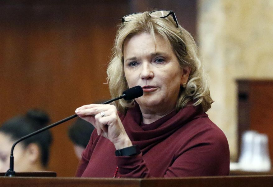 Rep. Becky Currie, R-Brookhaven, a registered nurse, explains a portion of House Bill 1510, which could make the state the first to ban most abortions after 15 weeks of pregnancy in House chambers at the Capitol in Jackson, Miss., Friday, Feb. 2, 2018. Mississippi already bans most abortions after 20 weeks, but the change could set up a possible court challenge. (AP Photo/Rogelio V. Solis)