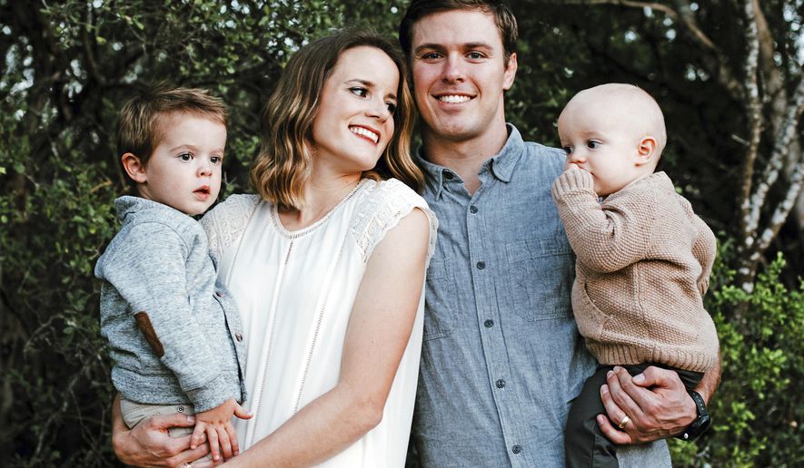 This Nov. 18, 2016 photo provided by Red Aspen Photography shows Ryan Folsom with his wife Lauren and sons Cal and Grady posing for a portrait in San Antonio, Texas. Grace Elizabeth Ward, a Northern California woman who drove her car head-on into freeway traffic in an alleged suicide attempt, has been charged with the second-degree murder of Ryan Folsom, the driver she struck, authorities said Thursday, Feb. 1, 2018. Ward, 28, suffered a broken leg in the accident that killed Folsom on Interstate 5 on Jan. 7, 2018. Folsom, 29, was from Medford, Ore., and attended medical school in San Antonio, Texas. (Ashleigh Cropper/Red Aspen Photography via AP)