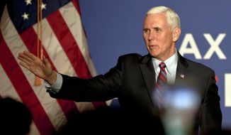 Vice President Mike Pence waves as he arrives for an America First Policies Event, Friday, Feb. 2, 2018, in Pittsburgh. (AP Photo/Keith Srakocic)
