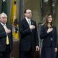 Attorney General Jeff Sessions accompanied by Deputy Attorney General Rod Rosenstein and Associate Attorney General Rachel Brand, listen the national anthem during the opening ceremony of the summit on Efforts to Combat Human Trafficking at Department of Justice in Washington, Friday, Feb. 2, 2018. President Donald Trump, dogged by an unrelenting investigation into his campaign&#39;s ties to Russia, lashes out at the FBI and Justice Department as politically biased ahead of the expected release of a classified Republican memo criticizing FBI surveillance tactics.   (AP Photo/Jose Luis Magana)