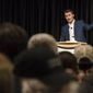 In this Friday, Feb 2, 2018, photo conservative activist Charlie Kirk, a speaker with Turning Point USA gives his speech at the Lory Student Center on campus at Colorado State University in Fort Collins, Colo. Police broke up a crowd of about 200 demonstrators at the university after a group arrived armed with bats and shields. Campus police say there were no arrests at the demonstration late Friday. (Timothy Hurst/The Coloradoan via AP)