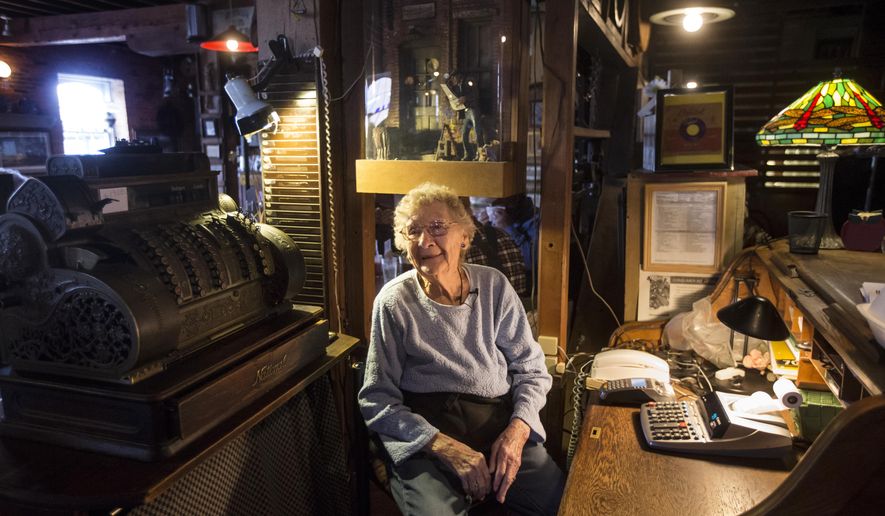 Marie Hainline works the register at the Bonaparte Retreat in Bonaparte Tuesday, Jan. 23, 2018. At 94 years old Marie is thought to be the oldest waitress in Iowa. (Zach Boyden-Holmes/The Des Moines Register via AP)