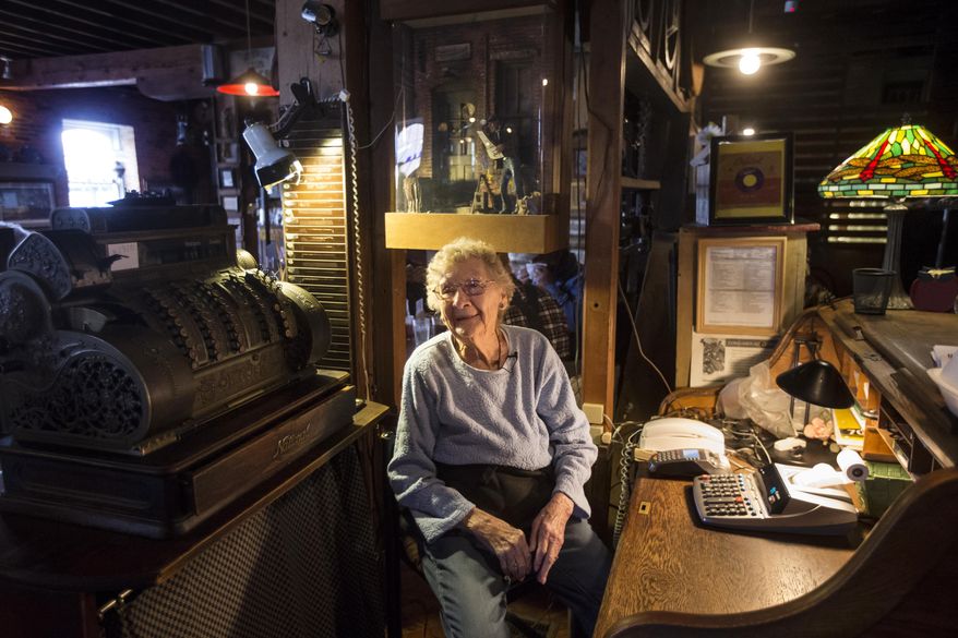 Marie Hainline works the register at the Bonaparte Retreat in Bonaparte Tuesday, Jan. 23, 2018. At 94 years old Marie is thought to be the oldest waitress in Iowa. (Zach Boyden-Holmes/The Des Moines Register via AP)