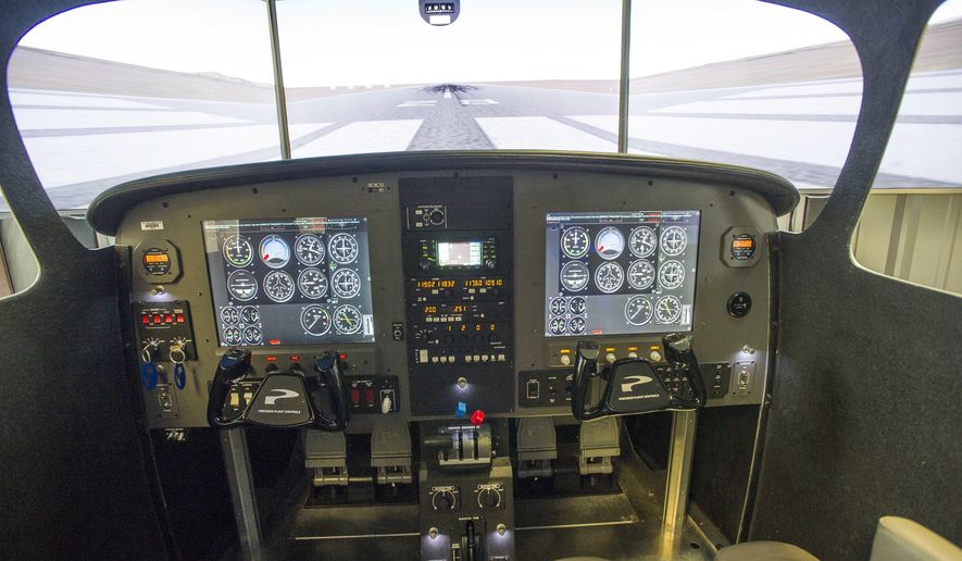 A Wednesday, Jan. 24, 2018 photo shows the cockpit area of the flight simulator at Outlaw Aviation in Sisters, Ore. (Ryan Brennecke/The Bulletin via AP)