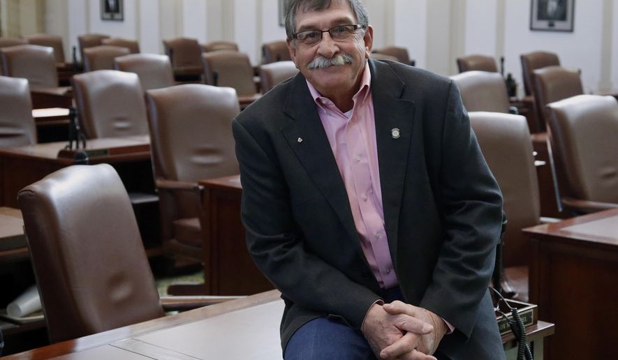 Oklahoma state Rep. Rick West -R-Heavener, poses for a photo in the House chamber at the Capitol in Oklahoma City, Thursday, Feb. 1, 2018. West has introduced a bill requiring certain sex offenders to undergo so-called "chemical castration" as a condition of release. (AP Photo/Sue Ogrocki)