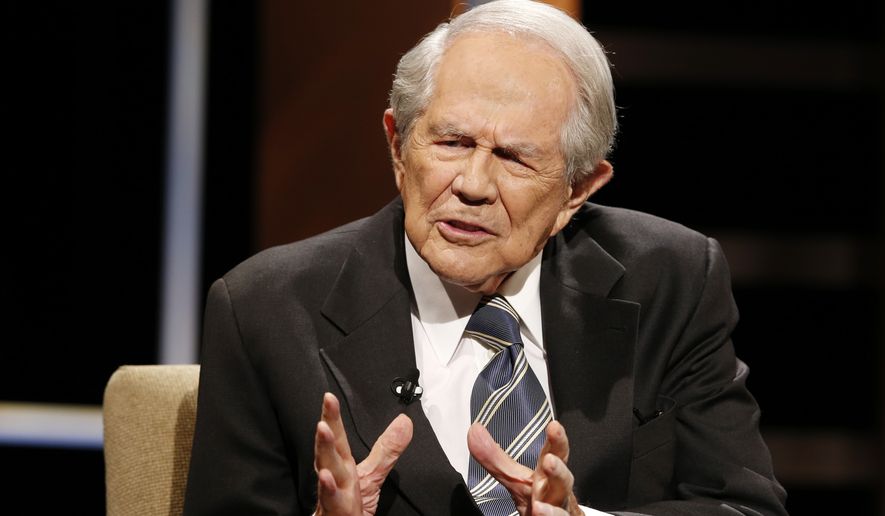 The Rev. Pat Robertson gestures as he poses a question to Republican presidential candidate former Florida Gov. Jeb Bush during a Presidential candidate forum at Regent University in Virginia Beach, Va., Friday, Oct. 23, 2015.    (AP Photo/Steve Helber)