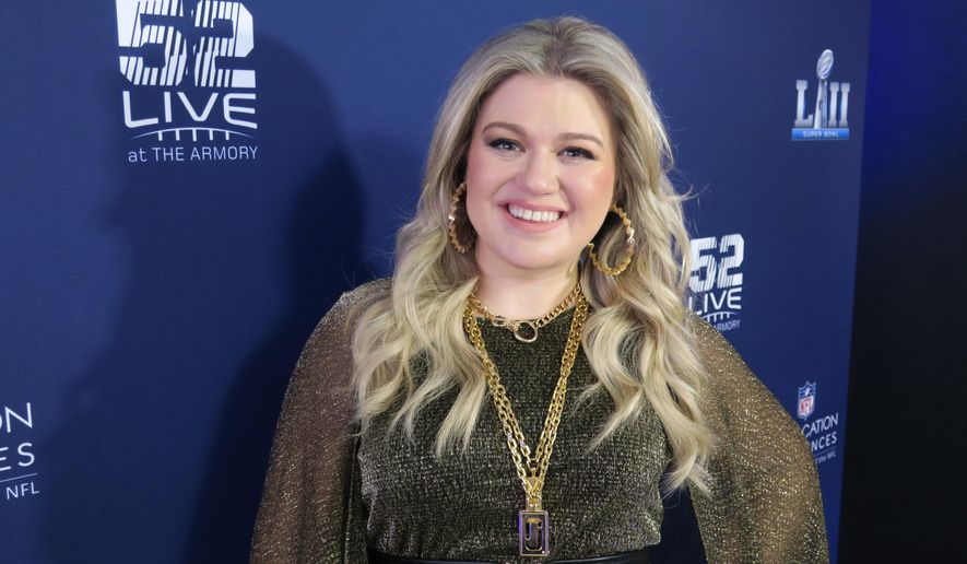 Kelly Clarkson appears at Nomadic Live at The Armory prior to the Super Bowl on Sunday, Feb. 4, 2018 in Minneapolis in this file photo. (AP Photo/John Carucci) **FILE**