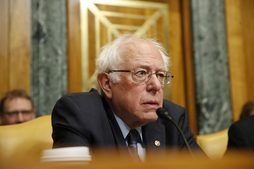 Senate Budget Committee Ranking Member Sen. Bernie Sanders, I-Vt., listens during a committee oversight hearing with testimony from Congressional Budget Office Director Keith Hall, Wednesday, Jan. 24, 2018, on Capitol Hill in Washington. (AP Photo/Jacquelyn Martin)