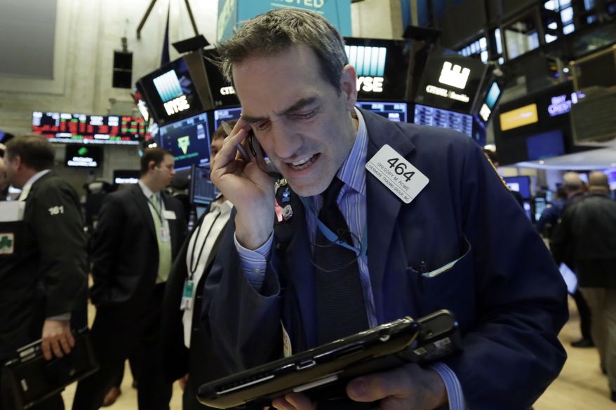 Trader Gregory Rowe works on the floor of the New York Stock Exchange, Monday, Feb. 5, 2018. Stock markets around the world took another pummeling Monday as investors continued to fret over rising U.S. bond yields. (AP Photo/Richard Drew)