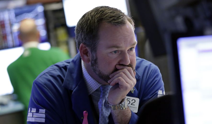 Specialists Charles Boeddinghaus works on the floor of the New York Stock Exchange, Monday, Feb. 5, 2018. The Dow Jones industrial average plunged more than 1,100 points Monday as stocks took their worst loss in six and a half years. (AP Photo/Richard Drew)