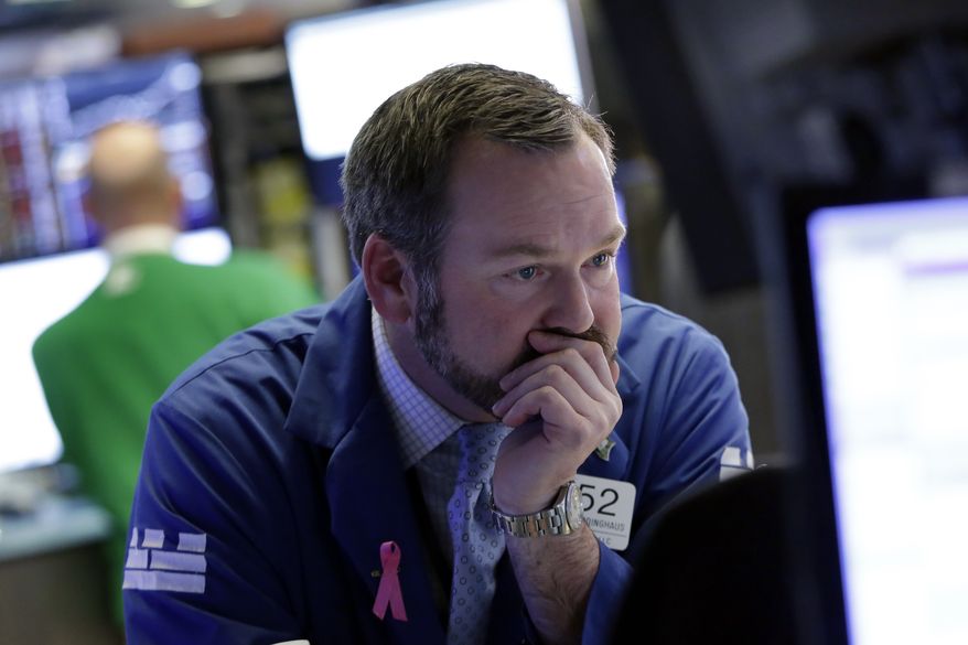 Specialists Charles Boeddinghaus works on the floor of the New York Stock Exchange, Monday, Feb. 5, 2018. The Dow Jones industrial average plunged more than 1,100 points Monday as stocks took their worst loss in six and a half years. (AP Photo/Richard Drew)