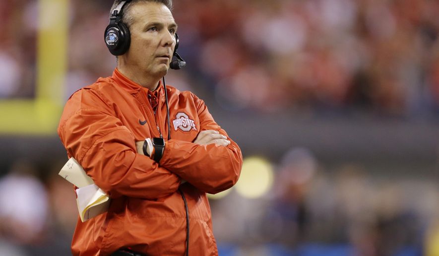 FILE - In this Dec. 2, 2017, file photo, Ohio State head coach Urban Meyer watches the first half of the Big Ten championship NCAA college football game against Wisconsin in Indianapolis. There's a strange sense of calm that has replaced the tumult typically associated with this time of year on the college football recruiting calendar. The December signing period has removed much of the suspense from the traditional national signing day that takes place the first Wednesday of February. Most of the top high school prospects already signed in December. (AP Photo/Michael Conroy, File)