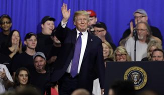 President Trump is getting encouragement from polls showing a rising job approval rating and a narrowing of the generic ballot for midterm elections. (Associated Press/File)

