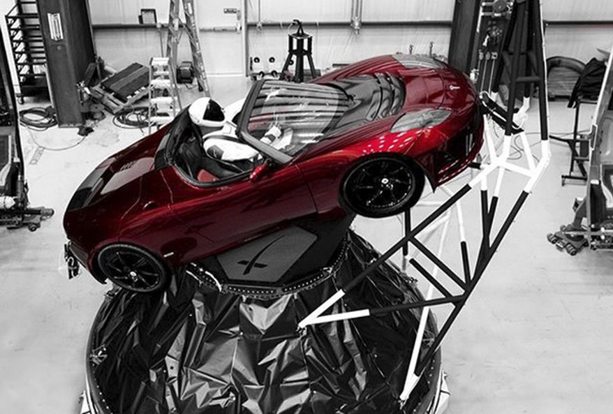A mannequin Starman sits at the wheel of a Tesla Roadster in this photo posted on the Instagram account of Elon Musk, head of auto company Tesla and founder of the private space company SpaceX. The car will be on board when SpaceX launches its new rocket, the Falcon Heavy, from Kennedy Space Center at Cape Canaveral, Fla., scheduled for Tuesday, Feb. 6, 2018. (Courtesy of Elon Musk/Instagram via AP)