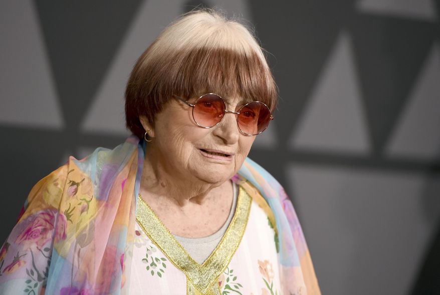 FILE - In this Nov. 11, 2017 file photo, filmmaker Agnes Varda arrives at the 9th annual Governors Awards in Los Angeles. Varda shares the documentary feature Oscar nomination for “Faces Places” with her co-director, JR, and her producer daughter, Rosalie Varda. She received an honorary Academy Award in November recognizing her decades of filmmaking. (Photo by Jordan Strauss/Invision/AP, File)
