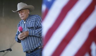 In this April 11, 2015, file photo, rancher Cliven Bundy speaks at an event in Bunkerville, Nev. (AP Photo/John Locher, File)