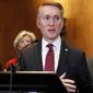 Sen. James Lankford, R-Okla., left, with Sen. Angus King, I-Maine, right, speaks about immigration and the Deferred Action for Childhood Arrivals (DACA) program Wednesday, Feb. 7, 2018, on Capitol Hill in Washington. (AP Photo/Jacquelyn Martin) ** FILE **