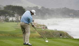 Dallas Cowboys quarterback Tony Romo hits from the 10th tee of the Pebble Beach Golf Links during the AT&amp;amp;T Pebble Beach National Pro-Am golf tournament in Pebble Beach, Calif. Romo has accepted an exemption to play a PGA Tour event in March in the Dominican Republic. (AP Photo/Eric Risberg)