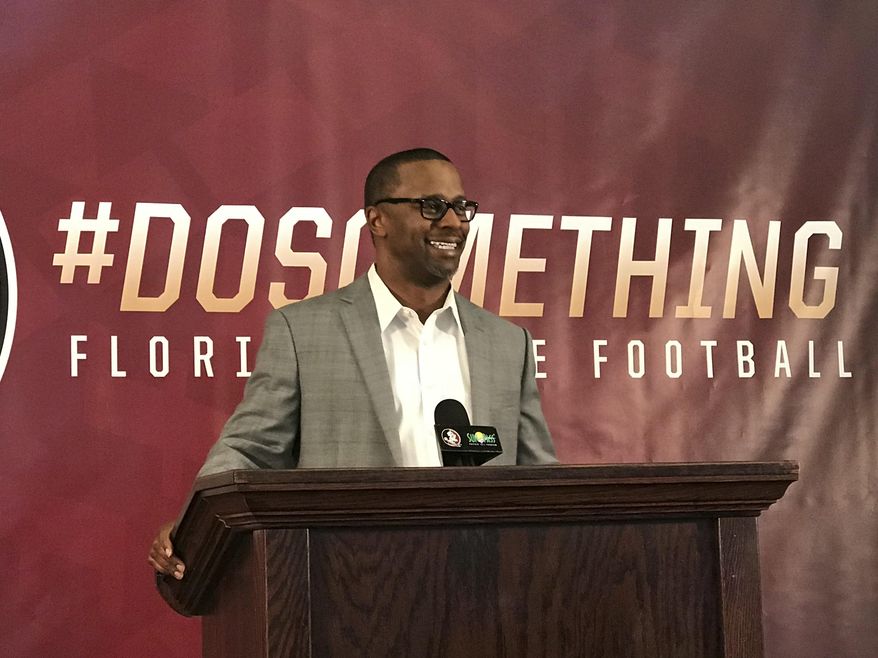 Florida State NCAA college football head coach Willie Taggart discusses his first recruiting class at the school during a press conference in Tallahassee, Fla., Wednesday, Feb. 7, 2018. (AP Photo/Joe Reedy)