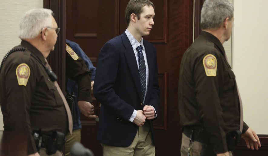 Defendant David Eisenhauer enters Montgomery County Circuit Court in Christiansburg, Va., Wednesday, Feb. 7 2018. Eisenhauer is accused of killing 13-year-old Nicole Madison Lovell on Jan. 27, 2016. (Matt Gentry/The Roanoke Times via AP, Pool)