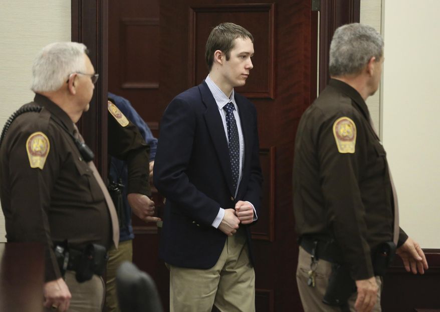 Defendant David Eisenhauer enters Montgomery County Circuit Court in Christiansburg, Va., Wednesday, Feb. 7 2018. Eisenhauer is accused of killing 13-year-old Nicole Madison Lovell on Jan. 27, 2016. (Matt Gentry/The Roanoke Times via AP, Pool)