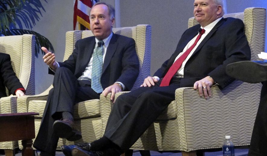 Wisconsin Assembly Speaker Robin Vos, left, and Senate Majority Leader Scott Fitzgerald voice their support for interstate tolling in Wisconsin at a meeting of the Wisconsin Counties Association on Wednesday, Feb. 7, 2018, in Madison, Wis. (AP Photo/Scott Bauer).