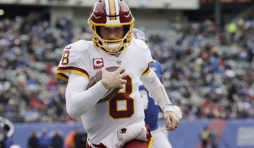 FILE - In this Dec. 31, 2017, file photo, Washington Redskins quarterback Kirk Cousins (8) rushes for a touchdown during the first half of an NFL football game against the New York Giants in East Rutherford, N.J. The quarterback carrousel began in the days before the Super Bowl when Kansas City agreed to trade Alex Smith to the Redskins. The deal, which cannot be finalized until March 14, spells the end of Cousins&#39; time in Washington and hands the Chiefs&#39; job to Patrick Mahomes III, the 10th pick in last year&#39;s draft out of Texas Tech. (AP Photo/Mark Lennihan, File)