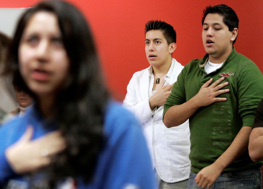 In this Thursday, Feb. 7, 2008, file photo Manuel Rendon, center in white, along with fellow members, recite the Pledge of Allegiance at a meeting of the Collin County LULAC Young Adults Council #4780 at Collin County Community College in Plano, Texas. The oldest Latino civil rights organization in the U.S. is facing turmoil over its leader&#39;s initial support for President Donald Trump&#39;s immigration plan and it comes amid evolving membership. League of United Latin American Citizens members are pressuring President Roger Rocha to resign after he wrote a letter in support of Trump&#39;s proposal on increased border security. (AP Photo/Tony Gutierrez,File)