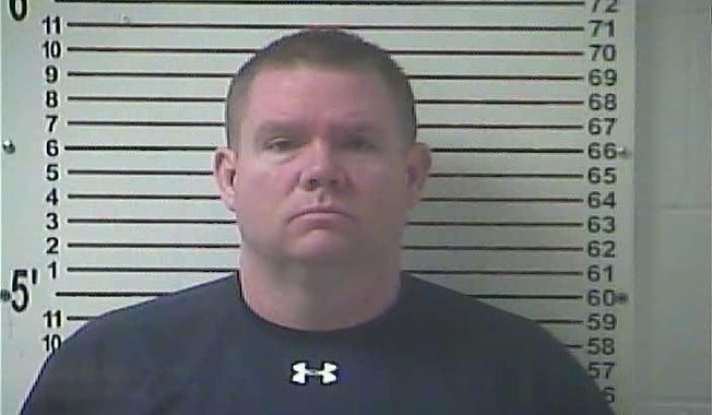 FILE - This Oct. 13, 2016, file photo released by the Hardin County Detention Center, shows Stephen Kyle Goodlett, the former principal of LaRue County, Ky. A federal judge is set to sentence former Kentucky high school principal Goodlett  in U.S. District Court in Louisville Thursday, Feb. 8, 2018, on child pornography charges stemming from uploaded nude images of a student whose cellphone he confiscated. (Hardin County Detention Center via AP, File)