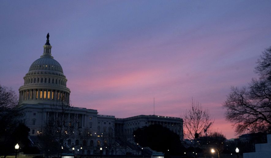 The Capitol Dome of the Capitol Building at sunrise, Friday, Feb. 9, 2018, in Washington. After another government shutdown, congress has passed a sweeping long term spending bill which President Donald Trump is expected to sign later this morning. (AP Photo/Andrew Harnik)