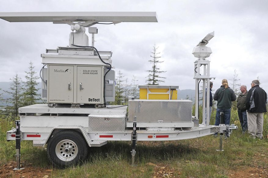 FILE - In this Wednesday, June 16, 2010 photo, a "Merlin" sits atop Radar Ridge recording any nearby Marbled Murrelet activity near Naselle, Wash. Environmental officials in Oregon will decide Friday, Feb. 9, 2018, whether to increase protections for a rare kind of seabird that nests far inland in old-growth forests. The Oregon Commission on Fish and Wildlife is expected to vote on whether to change the listing of the marbled murrelet from "threatened" to "endangered" after receiving a petition from a coalition of environmental groups concerned about declining numbers of the small bird. (MacLeod Pappidas/The Daily World via AP, File)