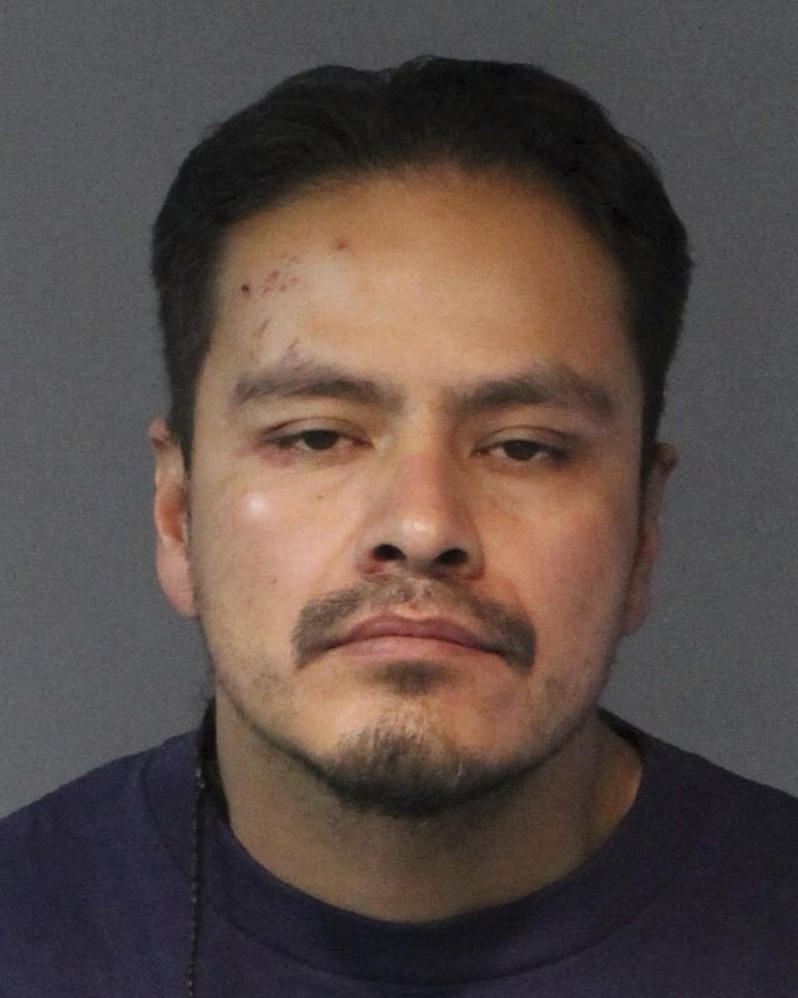 This Thursday, Feb. 8, 2018 photo provided by the Washoe County Jail shows Michael Kizer in Reno, Nev. Police arrested 34-year-old Michael Kizer in Sparks Thursday and charged him with open murder in Tuesday's fatal shooting of 37-year-old Patrick McDaniel in an apartment parking lot east of the Peppermill hotel-casino. (Washoe County Jail via AP)