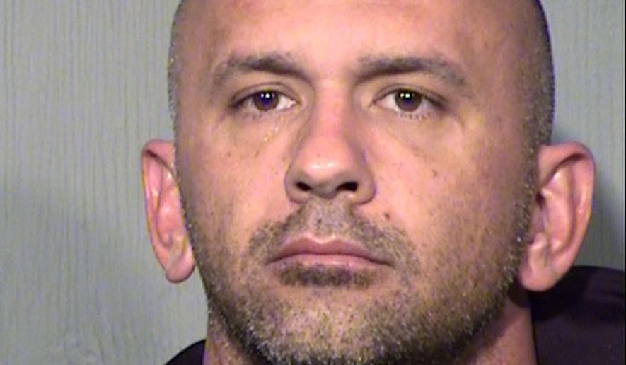 In this Friday, Feb. 9, 2018 booking photo released by the Maricopa County Sheriff's Office shows suspect Ryan Donahue at the Maricopa County jail in Phoenix, Ariz. Donahue, a 36-year-old city firefighter, is accused of entering fire stations and stealing from fellow firefighters, sometimes after setting trash fires to keep fire crews away. He remains jailed after being arrested Friday, Feb. 9, 2018, on suspicion of theft, arson, burglary and criminal damage. Police say surveillance and tips led to the arrest of Donahue, an 11-year Fire Department employee who worked as a rover rotating among fire stations. According to police, Donahue committed the thefts while off-duty and while crews were out on calls.(Maricopa County Sheriff's Office via AP)