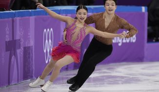 Maia Shibutani and Alex Shibutani of the United States perform during the ice dance short dance team event in the Gangneung Ice Arena at the 2018 Winter Olympics in Gangneung, South Korea, Sunday, Feb. 11, 2018. (AP Photo/Julie Jacobson)