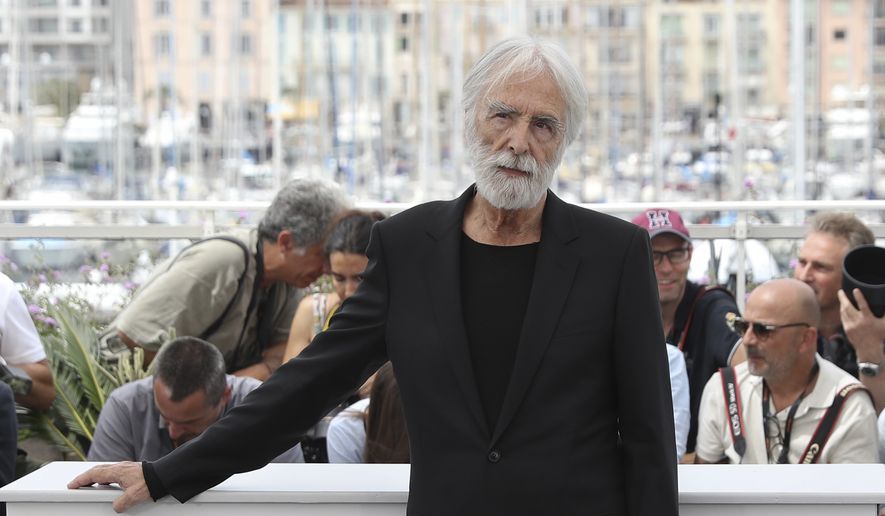 Director Michael Haneke poses for photographers during the photo call for the film Happy End at the 70th international film festival, Cannes, southern France, Monday, May 22, 2017. (AP Photo/Alastair Grant)