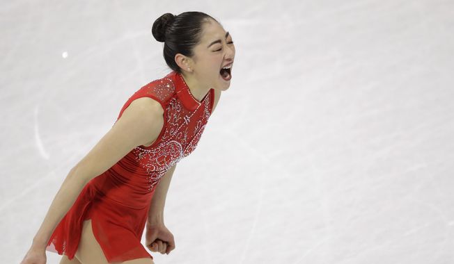 Mirai Nagasu of the United States celebrates after her performance in the ladies single skating free skating in the Gangneung Ice Arena at the 2018 Winter Olympics in Gangneung, South Korea, Monday, Feb. 12, 2018. (AP Photo/Bernat Armangue)