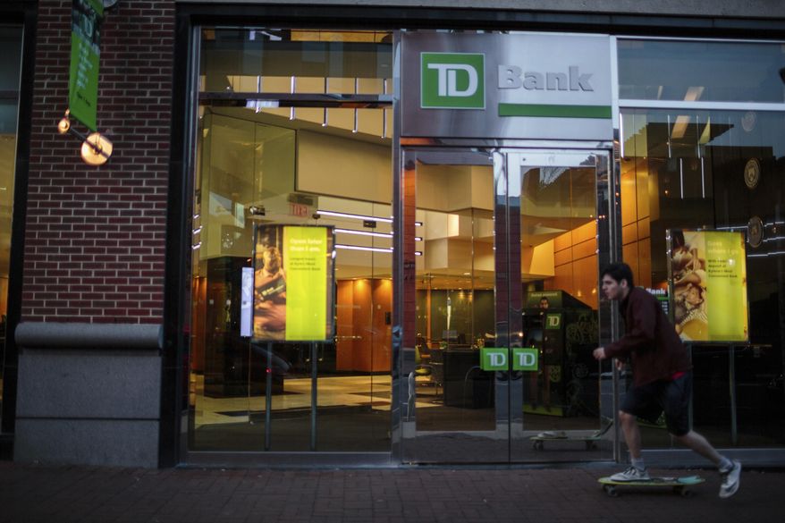 ADVANCE FOR USE THURSDAY, FEB. 15, 2018, AT 12:01 A.M. AND THEREAFTER - This Nov. 12, 2017, photo provided by Reveal shows a TD Bank storefront in Philadelphia. African American and Latino borrowers are more likely to get turned down by TD Bank than by any other major mortgage lender. The bank turned down 54 percent of black homebuyers and 45 percent of Latino homebuyers, more than three times the industry averages. (Sarah Blesener/Reveal via AP)