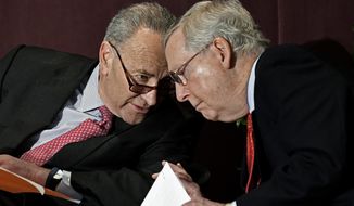 Senate Minority Leader Charles Schumer, D-N.Y., left, leans in to speak to Senate Majority Leader Mitch McConnell, R-Ky., before his speech at the McConnell Center&#x27;s Distinguished Speaker Series Monday, Feb. 12, 2018, in Louisville, Ky. (AP Photo/Timothy D. Easley) **FILE**