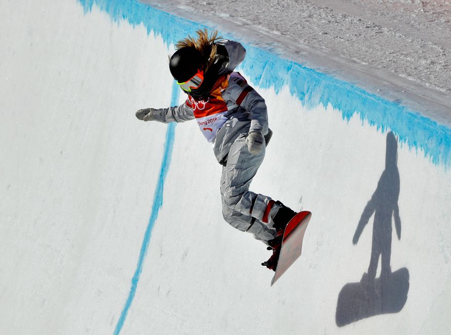 Chloe
Kim, of the United States, runs the course during the women's halfpipe finals at Phoenix Snow Park at the 2018 Winter Olympics in Pyeongchang, South Korea, Tuesday, Feb. 13, 2018. (AP Photo/Gregory Bull)