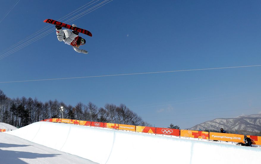 Chloe
Kim, of the United States, jumps during the women's halfpipe finals at Phoenix Snow Park at the 2018 Winter Olympics in Pyeongchang, South Korea, Tuesday, Feb. 13, 2018. (AP Photo/Kin Cheung)